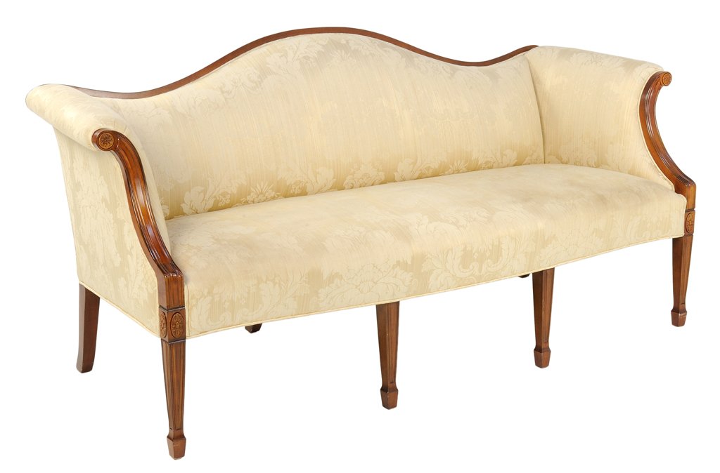A LOUIS XVI STYLE CAMEL BACK SOFA IN CRÈME DAMASK: A LOUIS XVI STYLE CAMEL BACK SOFA IN CRÈME DAMASK Late 20th - 21st Century A fine Louis XVI style camel back sofa is covered in an attractive creme fabric, with block and rosette details, is raised o