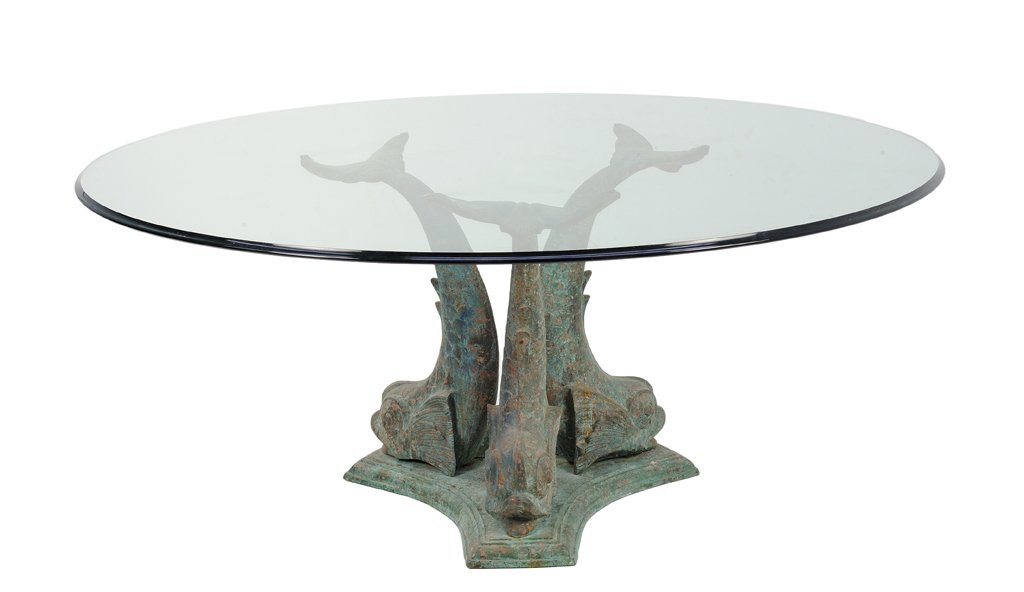 A BAKER FURNITURE BRONZE DOLPHIN TABLE BASE WITH ROUND: A BAKER FURNITURE BRONZE DOLPHIN TABLE BASE WITH ROUND BEVELED GLASS TOP 20th Century The round, beveled glass top is supported by a tripartite base with three bronze dolphins. Very good condition, gr