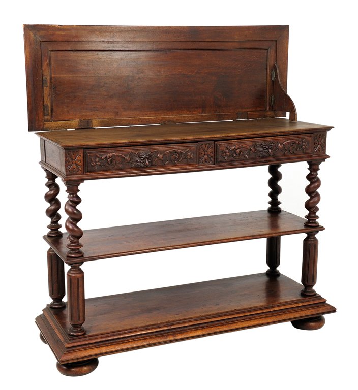 A LATE VICTORIAN STYLE CONVERTIBLE SIDEBOARD WITH SUGAR: A LATE VICTORIAN STYLE CONVERTIBLE SIDEBOARD WITH SUGAR TWISTS AND LIONS Late 19th - Early 20th Century A convertible late Victorian style sideboard features a stepped edge with carved demilune detail