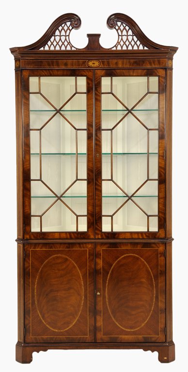 AN "E.J. VICTOR" FLAME MAHOGANY INLAID ENGLISH STYLE: AN ""E.J. VICTOR"" FLAME MAHOGANY INLAID ENGLISH STYLE CURIO CORNER CABINET WITH MARQUETRY 20th Century The arched cornice featuring mahogany latticework and marquetry above a flame mahogany conformin