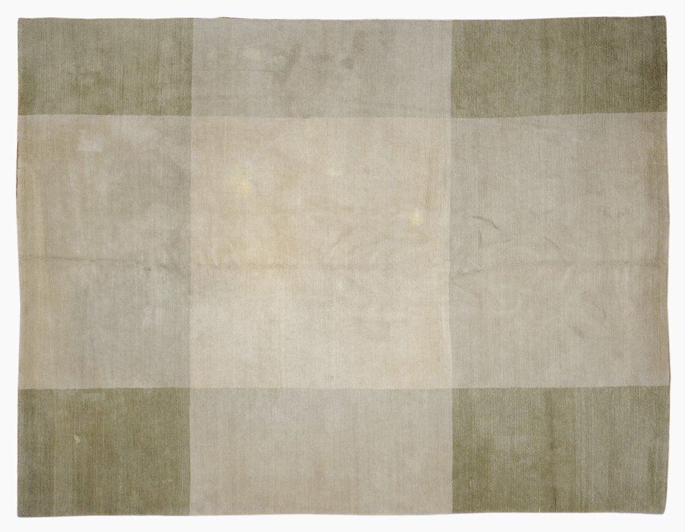 A NEPAL TAUPE AND OLIVE GEOMETRIC BLOCK RUG: A NEPAL TAUPE AND OLIVE GEOMETRIC BLOCK RUG Nepal, 20th Century Wool pile. Contemporary design. Taupe and olive green. Size:9ft x 8ft Good condition.
