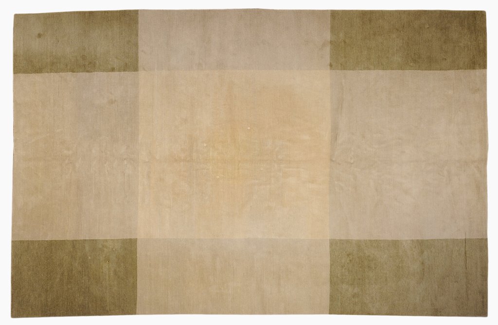 A NEPAL TAUPE AND OLIVE GEOMETRIC BLOCK RUG: A NEPAL TAUPE AND OLIVE GEOMETRIC BLOCK RUG Nepal, 20th Century Wool pile. Contemporary design. Taupe and olive green. Size:13ft x 9ft Good condition.