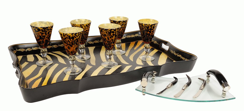 A SAFARI CHIC BRUNCH COLLECTION INCLUDING A HORN CHEESE: A SAFARI CHIC BRUNCH COLLECTION INCLUDING A HORN CHEESE PLATTER, SIX CHEETAH GLASSES AND ZEBRA PRINT TRAY 21st Century A safar chic breakfast collection includes a horn handle cheese tray and knives, 