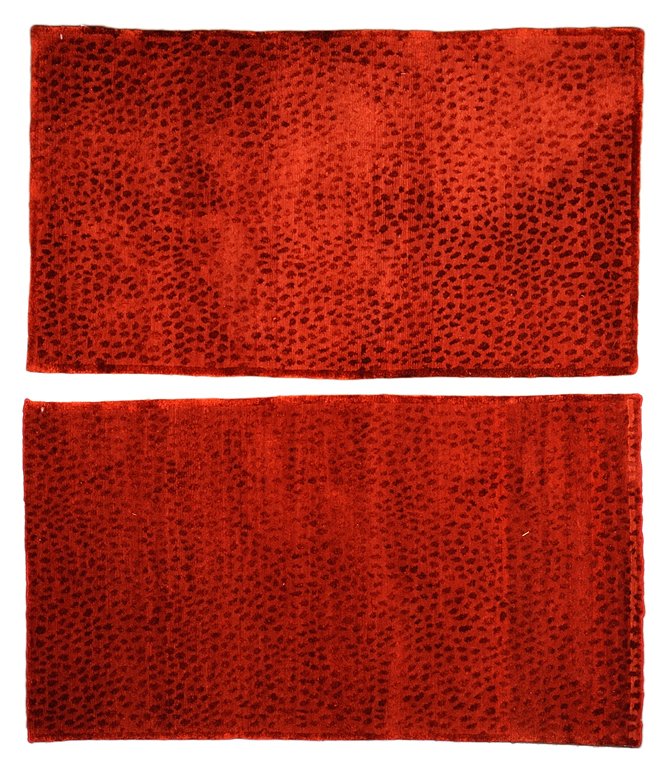 A PAIR OF CRIMSON NEPALI RUGS WITH SPOTTED PATTERN: A PAIR OF CRIMSON NEPALI RUGS WITH SPOTTED PATTERN 20th Century, Nepal. Silk and Wool. Size: 5ft x 2ft 10in Excellent condition.