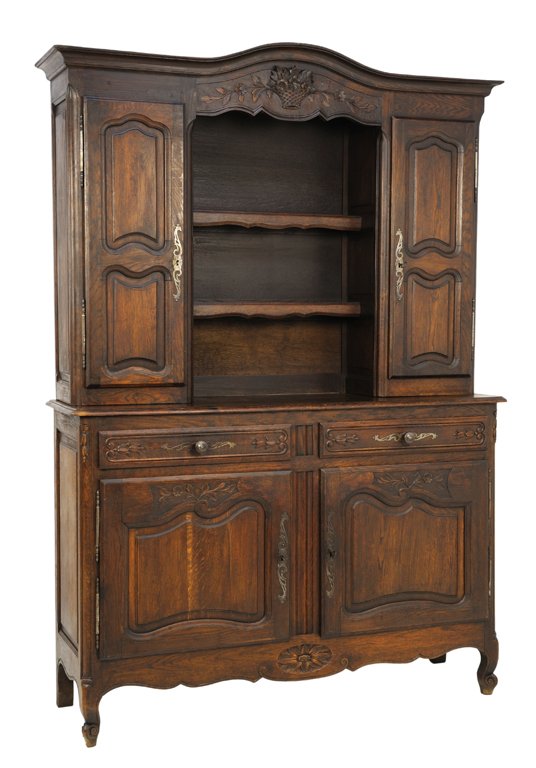 A LOUIS XV STYLE BUFFET IN MAHOGANY FINISH: A LOUIS XV STYLE BUFFET IN MAHOGANY FINISH Early 20th Century A buffet in mahogany finish featuring a slightly arched cornice with carved floral and foliate motif surmounting open shelving flanked by 