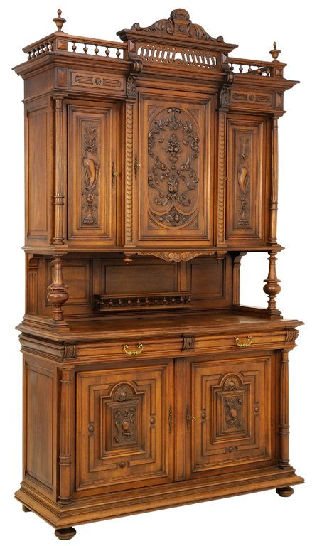 A FRENCH VICTORIAN STYLE BUFFET WITH FRUIT AND SCROLL: A FRENCH VICTORIAN STYLE BUFFET WITH FRUIT AND SCROLL SHIELDS Early-Mid 20th Century A French Victorian style buffet with a carved acanthus pediment resting on a pierced finial and ""C"" scroll galler