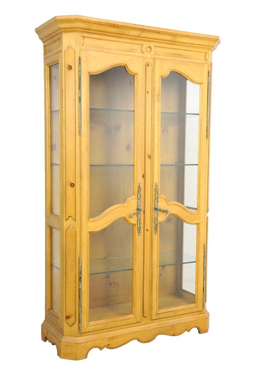 A BLOND LOUIS XVI STYLE DISPLAY VITRINE CABINET: A BLOND LOUIS XVI STYLE DISPLAY VITRINE CABINET 20th Century A blond Louis XVI style display cabinet features an everted stepped cornice, carved frieze, glazed on three sides, having four glass shelvi
