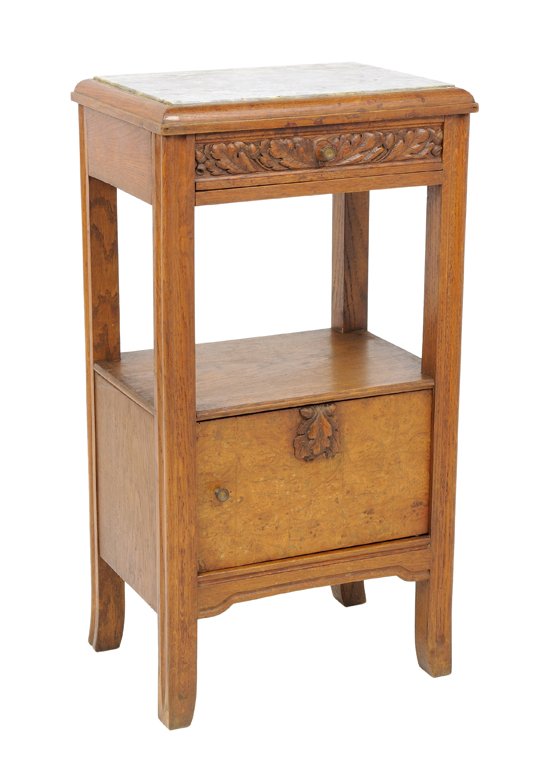 A FRENCH ART DECO STYLE OAK LAMP TABLE WITH CARVED: A FRENCH ART DECO STYLE OAK LAMP TABLE WITH CARVED ACORNS AND MARBLE TOP Early 20th Century, France An antique lamp table is topped with a white marble top with carved leaf and acorn drawer, having ce