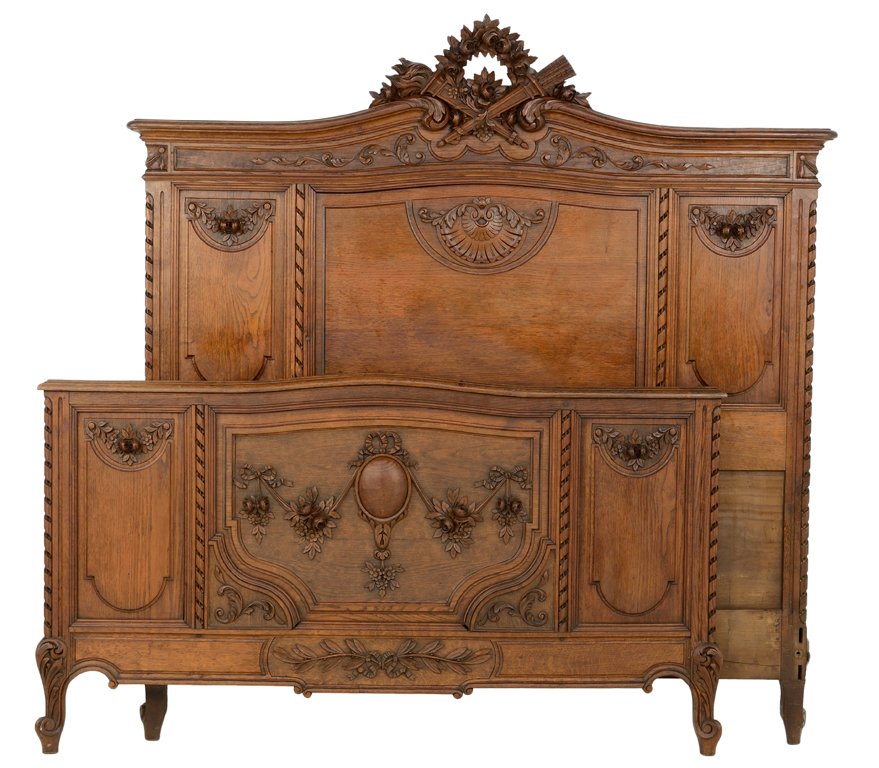 A FRENCH VICTORIAN EMPIRE STYLE BED WITH WREATH AND: A FRENCH VICTORIAN EMPIRE STYLE BED WITH WREATH AND TORCHIER Early 20th Century In very good condition. Width: 58 inches