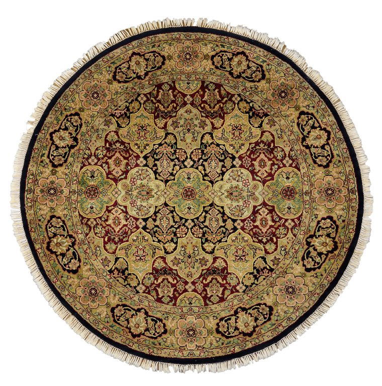 A HAND WOVEN INDIA JAIPUR ROUND RUG