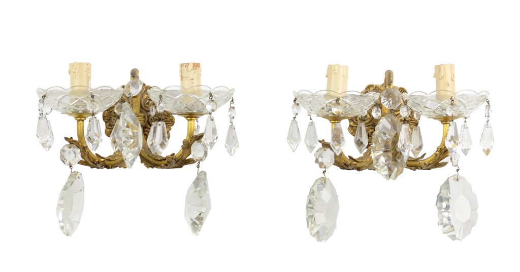 A BRONZE FINISH AND CRYSTAL TWO LIGHT PAIR OF SCONCES: A BRONZE FINISH AND CRYSTAL TWO LIGHT PAIR OF SCONCES Mid 20th century. In very good condition. 8 x 9 x 5¾ inches