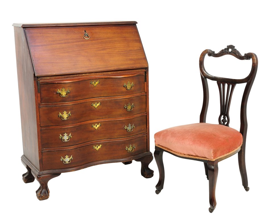 A CHIPPENDALE STYLE DESK AND A QUEEN ANNE STYLE CHAIR: A CHIPPENDALE STYLE DESK AND A QUEEN ANNE STYLE CHAIR Early 20th Century A Chippendale style flip top desk with a serpentine front and ball in claw feet is combined with a Queen Anne style chair. Mino