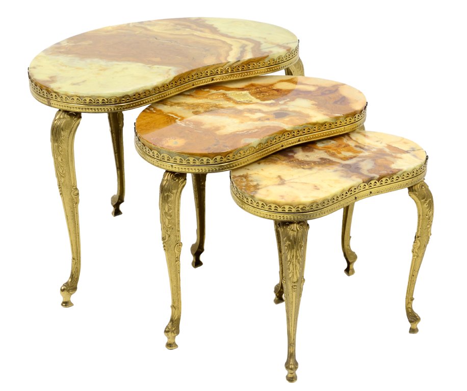 A LOT OF THREE ROCOCO STYLE GILT BRASS KIDNEY SHAPED: A LOT OF THREE ROCOCO STYLE GILT BRASS KIDNEY SHAPED NESTING TABLES WITH MARBLEIZED TOPS Mid 20th Century Crack to top surface of large table detected. Overall in good condition. 17½ x 23½ x 14¼ in