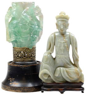 A CARVED NEPHRITE JADE SUNG DYNASTY-STYLE FIGURE AND A: A CARVED NEPHRITE JADE SUNG DYNASTY-STYLE FIGURE AND A CARVED FLUORITE BIRD AND FLOWER LUMINARY FRAGMENT Southeast Asia / China, circa Late 19th-Early 20th Century A grouping of two highly carved Asia