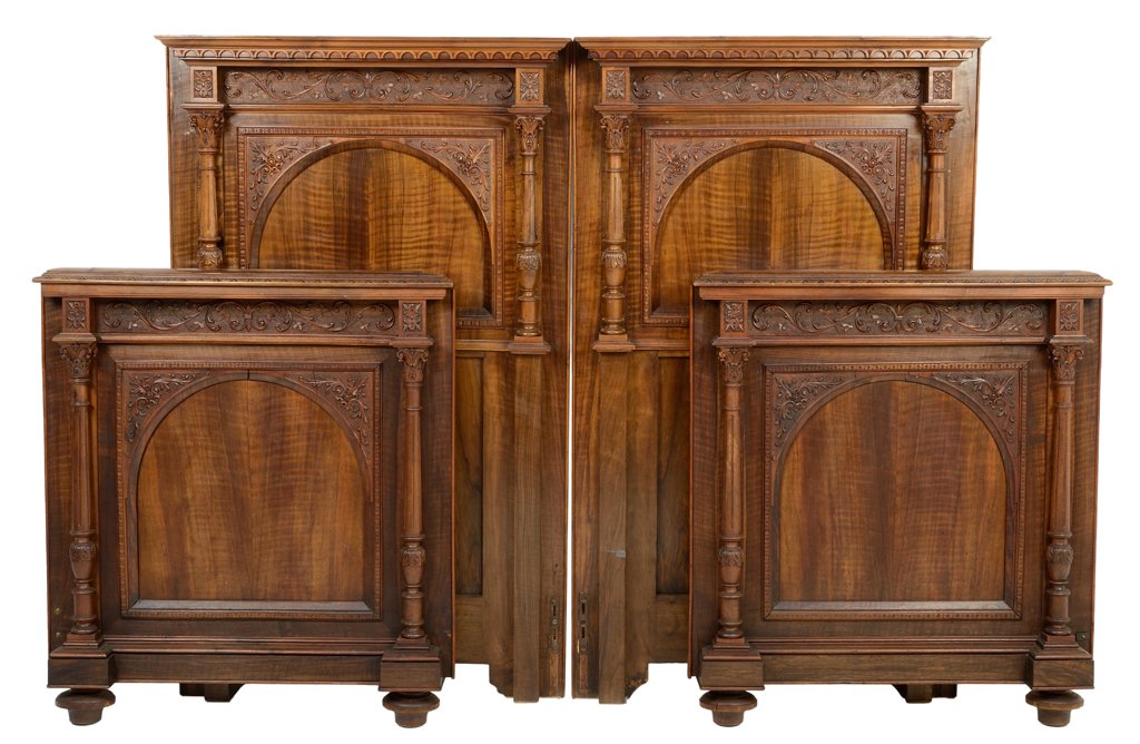 A PAIR OF NEOCLASSICAL CARVED ARCADE WALNUT FINISH BEDS: A PAIR OF NEOCLASSICAL CARVED ARCADE WALNUT FINISH BEDS Early 20th Century Wear commensurate with age and use detected, in overall very good condition. NOTE: Pair includes rails for only one bed. Widt