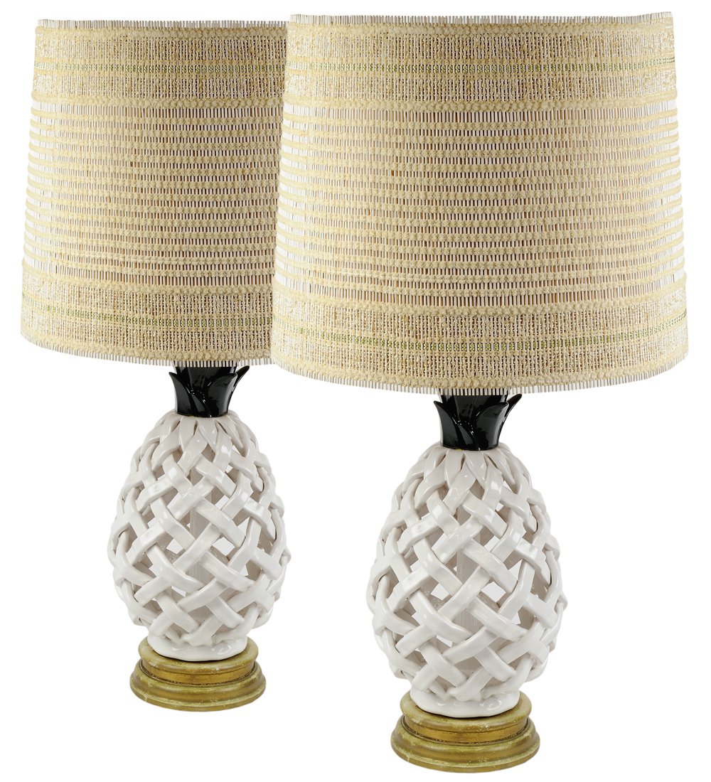 A PAIR OF VINTAGE BLACK AND WHITE RETICULATED BASKET: A PAIR OF VINTAGE BLACK AND WHITE RETICULATED BASKET WEAVE PINEAPPLE LAMPS Mid 20th Century Original lampshades included; minor wear detected. In very good condition, wear commensurate with age. 34¼ 