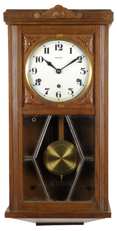 A DECO STYLE PENDULUM WALL CLOCK WITH GEOMETRIC GLASS: A DECO STYLE PENDULUM WALL CLOCK WITH GEOMETRIC GLASS DETAIL Early-Mid 20th Century Minor abrasions to finish. In very good condition, wear commensurate with age. 26½ x 12¾ x 7 inches
