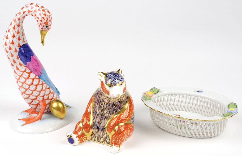 HERAND AND ROYAL CROWN DERBY: HERAND AND ROYAL CROWN DERBY The three piece group includes two pieces of Herand, a small oval dish with lattice band enclosure, applied flowers and hand painting, a large polychrome goose with golden