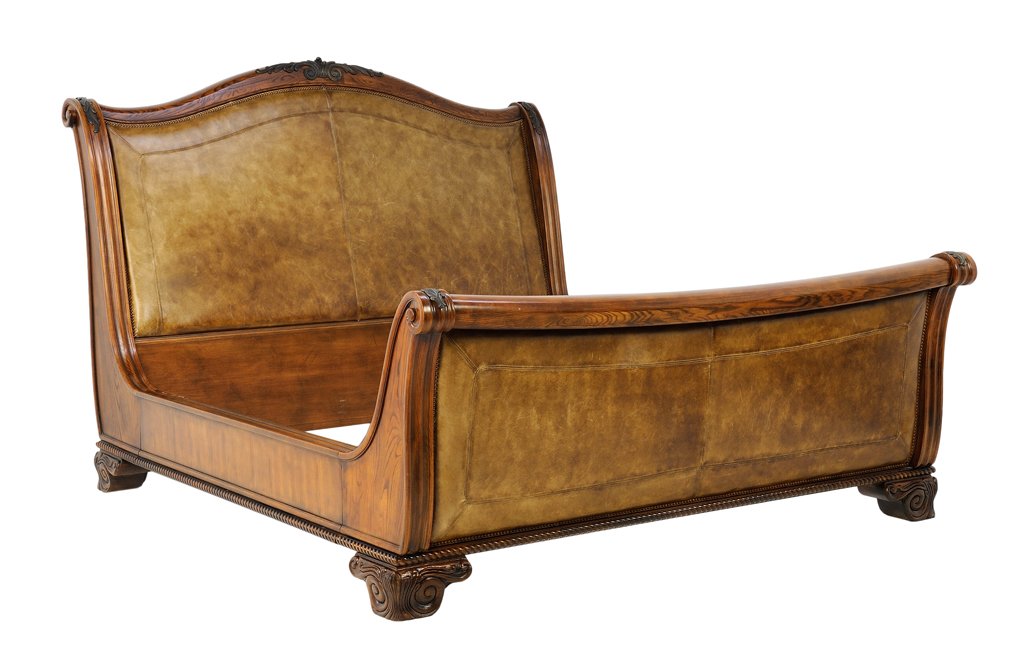 A HENREDON KING SIZE SLEIGH BED WITH LEATHER INSET: A HENREDON KING SIZE SLEIGH BED WITH LEATHER INSET 20th Century A king sleigh bed from the Henredon Alfresco collection in Palais finish featuring a supple brown leather back on the head and footboard