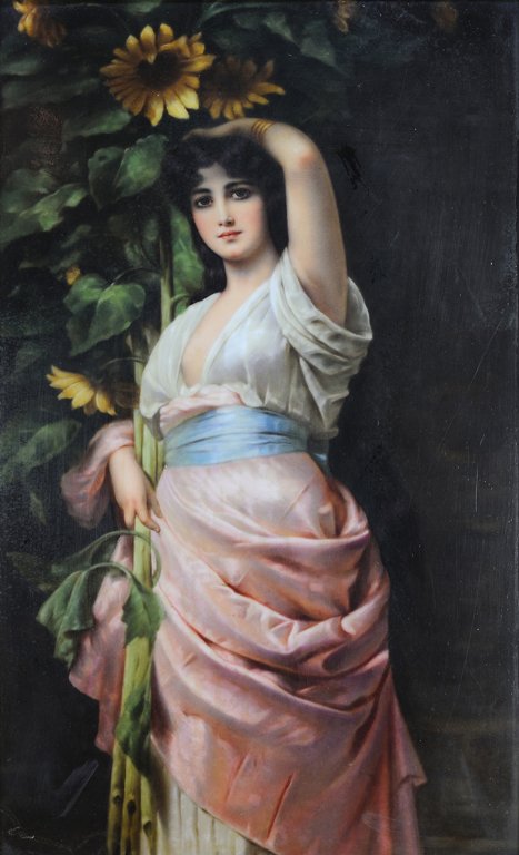 A KPM GERMAN PORCELAIN PLAQUE: A KPM GERMAN PORCELAIN PLAQUE Late 19th-Early 20th Century The hand painted KPM porcelain plaque in period giltwood frame depicting a dark haired girl beneath sunflowers. Wear to gilding and minor los