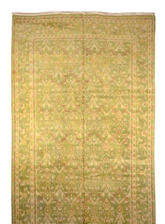 A NEPALESE HAND WOVEN WOOL RUG: A NEPALESE HAND WOVEN WOOL RUG Nepal, 20th Century Wool pile. 17ft 9in x 9ft.