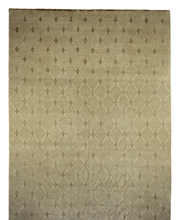 A HAND WOVEN OVERSIZED NEPALESE SILK AND WOOL OVERSIZED: A HAND WOVEN OVERSIZED NEPALESE SILK AND WOOL OVERSIZED RUG Nepal, 20th Century Fine wool pile with silk highlights. Light green and beige. Good condition. 22ft 4in x 11ft 2in