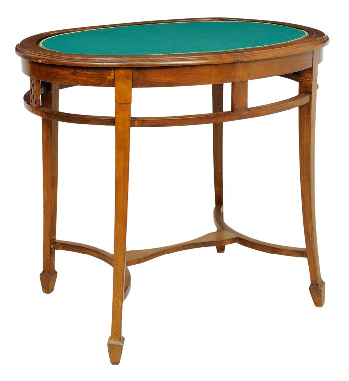 AN ITALIAN ART NOUVEAU STYLE MAHOGANY GAMES TABLE: AN ITALIAN ART NOUVEAU STYLE MAHOGANY GAMES TABLE The games table having an oval top inset with a felt playing surface, raised on square tapering legs, H-form stretcher, ending in spade feet. 29 3/4 x
