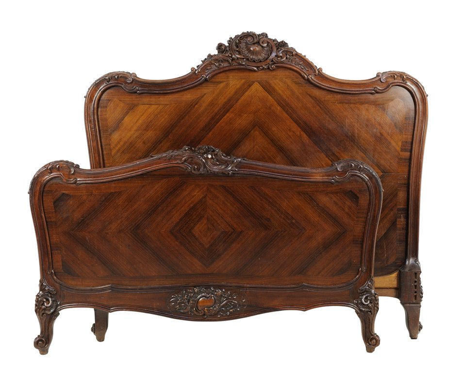 A FRENCH LOUIS XV STYLE ROSEWOOD PARQUETRY BED: A FRENCH LOUIS XV STYLE ROSEWOOD PARQUETRY BED The headboard having a curved top rail centered with an acanthus carved crest. Headboard and footboard raised on short cabriole legs. Comprising headboar