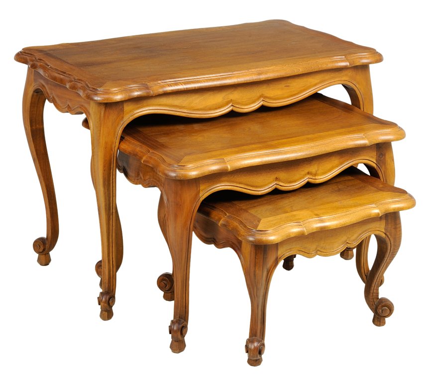 A SET OF THREE FRENCH PROVINCIAL STYLE NESTING TABLES: A SET OF THREE FRENCH PROVINCIAL STYLE NESTING TABLES The tables having a shaped rectangular top over a serpentine apron, raised on cabriole legs ending in scrolled toes. 21¼ x 31 x 17¾ inches.
