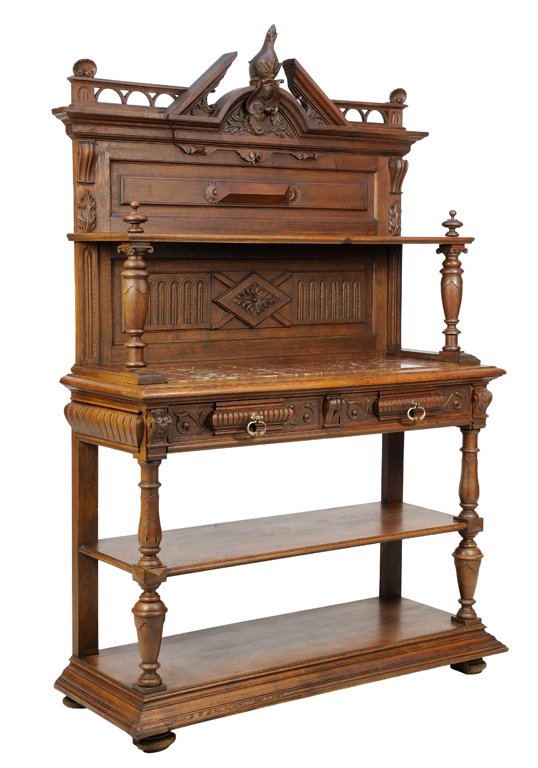 A FRENCH RENAISSANCE REVIVAL SIDEBOARD: A FRENCH RENAISSANCE REVIVAL SIDEBOARD The sideboard having a broken arch pediment centered with a foliate and shield carved crest, above a rectangular shelf raised on baluster form supports over the 