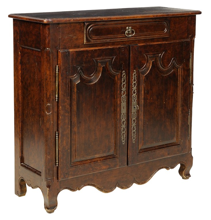 A FRENCH PROVINCIAL STYLE MAHOGANY CABINET: A FRENCH PROVINCIAL STYLE MAHOGANY CABINET The cabinet having a rectangular top over a single drawers and two paneled doors, coffer paneled sides, above a shaped apron, raised on short cabriole legs. 