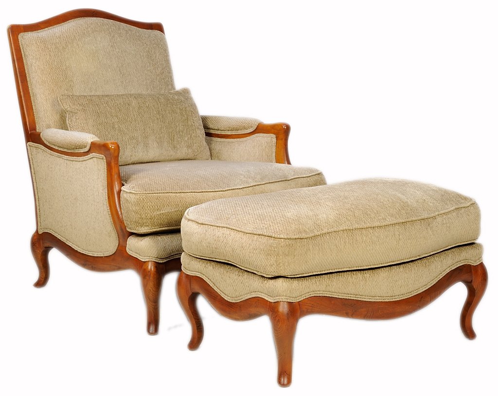 A PAIR OF FRENCH PROVINCIAL STYLE OAK BERGERES AND: A PAIR OF FRENCH PROVINCIAL STYLE OAK BERGERES AND OTTOMANS Each chair having a curved crest rail over the upholstered back and seat, above the shaped apron ending in short cabriole legs. Together wit