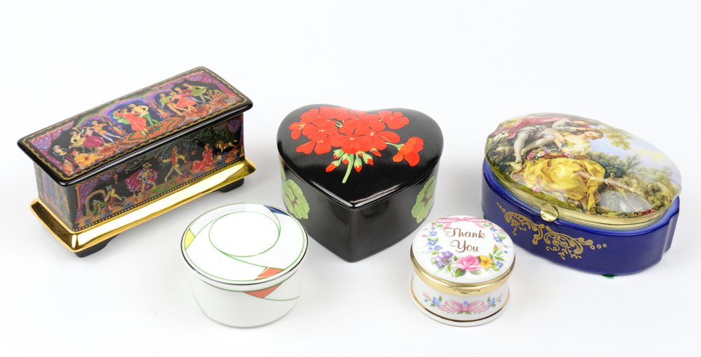 A GROUP OF FIVE PAINTED PORCELAIN BOXES: A GROUP OF FIVE PAINTED PORCELAIN BOXES The group comprising, among others, a Sybil Connolly for Tiffany & Company "Mrs. Delany's Flowers" heart-shaped box, a Staffordshire porcelain box, and a "Trio"