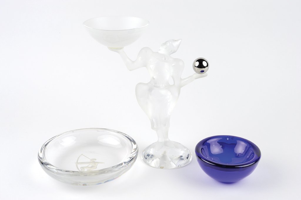 A GROUP OF ART GLASS PIECES 3 pieces total.: A GROUP OF ART GLASS PIECES The group comprised of a Cristal Sevres "Pierrot" clown, a Val St. Lambert "Sagittarius" finger bowl, signed at edge, and a Lundberg Studios cased glass paperweight bowl de