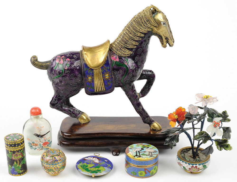 A GROUP OF ASSORTED CHINESE DECORATIVE OBJECTS 8 pieces: A GROUP OF ASSORTED CHINESE DECORATIVE OBJECTS The group comprised of a cloisonne and gilt horse figure with accompanying stand, a champlevé and gilt metal apple-form box, a round cloisonne pendant,