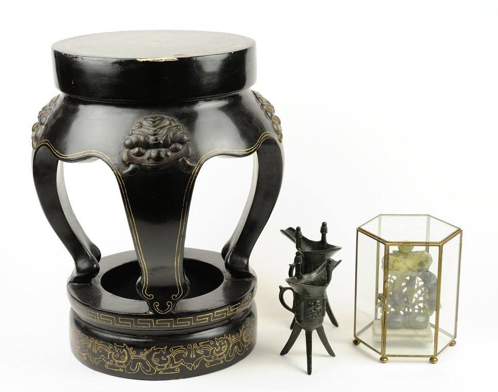 A COLLECTION OF ASIAN DECORATIVE OBJECTS: A COLLECTION OF ASIAN DECORATIVE OBJECTS The group consists of a pair of decorative cast metal libation cups of archaic form with a heavy verdigris finish, a hardstone carving of a koi beneath lotus b