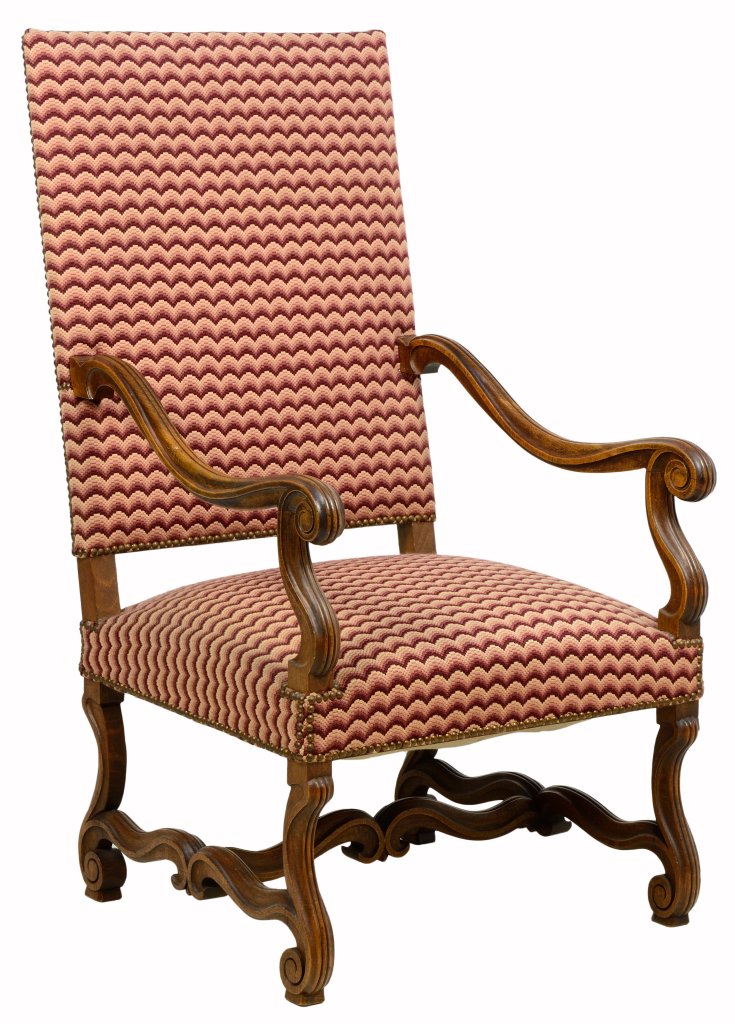 A FRENCH LOUIS XIV STYLE HALL CHAIR: A FRENCH LOUIS XIV STYLE HALL CHAIR The hall chair having a straight crest rail over the upholstered back and seat within scrolled open arms, raised on scrolled supports, joined by H-form stretcher. H
