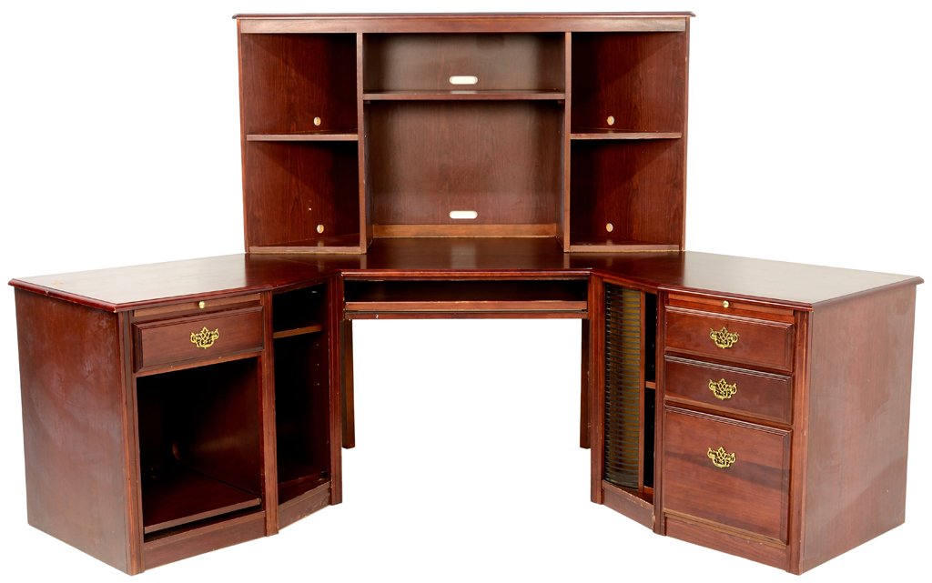 A RIVERSIDE EXECUTIVE MAHOGANY CORNER DESK: A RIVERSIDE EXECUTIVE MAHOGANY CORNER DESK The desk in three parts, comprising two columns of drawers centered with a bookshelf. H 61¼ x W 106 x D 58 inches.