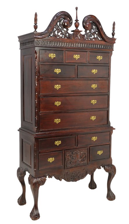A CHIPPENDALE STYLE MAHOGANY HIGHBOY: A CHIPPENDALE STYLE MAHOGANY HIGHBOY The highboy of rectangular form having a broken arch pierce carved pediment centered with an urn form finial flanked by two flame finials over a series of drawers,