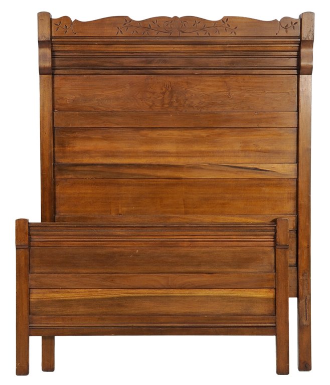 A FRENCH PROVINCIAL STYLE BED: A FRENCH PROVINCIAL STYLE BED The bed having a shaped top rail with scrolling foliate carved decoration, within twin supports, raised on square legs. Comprising headboard, footboard and side rails. W