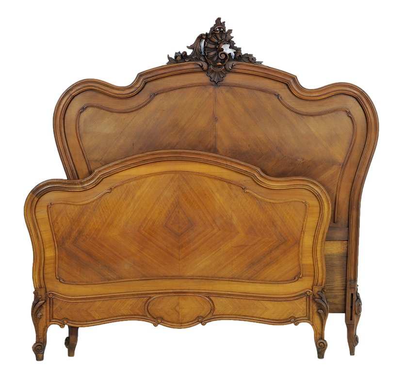A FRENCH LOUIS XV STYLE PARQUETRY BED: A FRENCH LOUIS XV STYLE PARQUETRY BED The headboard having a carved acanthus leaf crest over the curved top rail. Each raised on short cabriole legs ending in scrolled toes. Comprised of headboard, fo