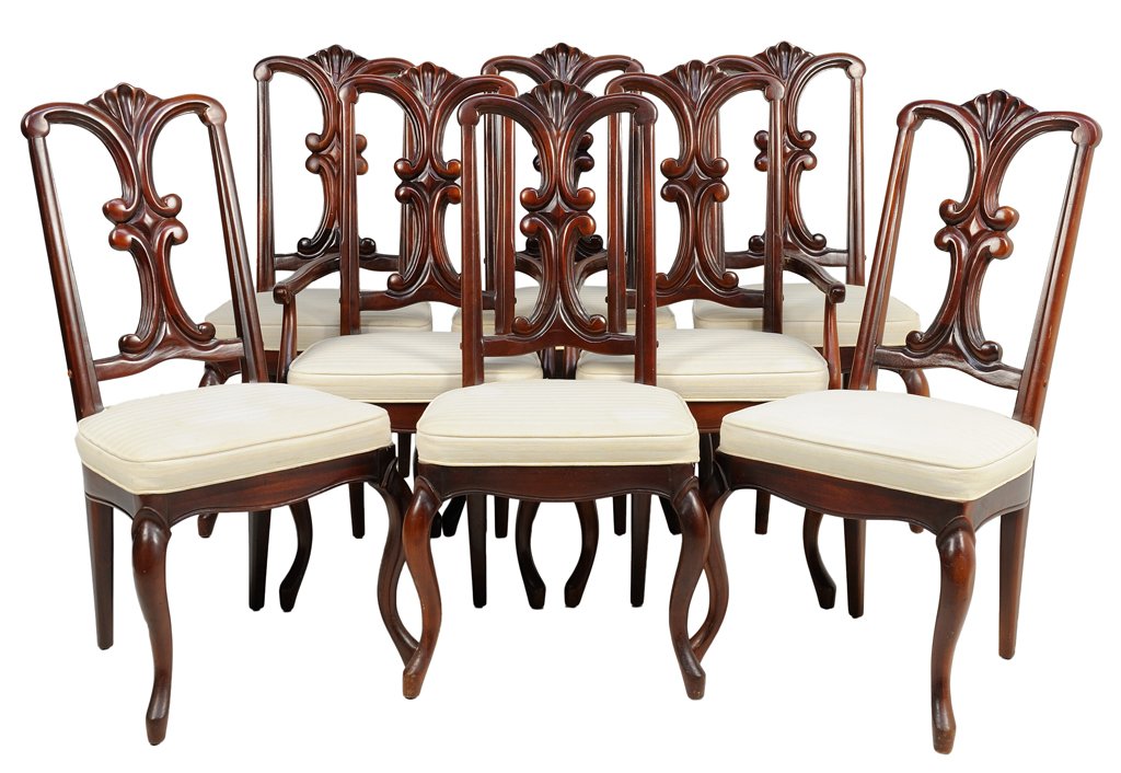 A SET OF EIGHT FRENCH NEOCLASSICAL STYLE DINING CHAIRS: A SET OF EIGHT FRENCH NEOCLASSICAL STYLE DINING CHAIRS Comprising two armchairs and six side chairs. Each chair having a shell carved vasiform backsplat over the trapezoidal upholstered seat, raised o