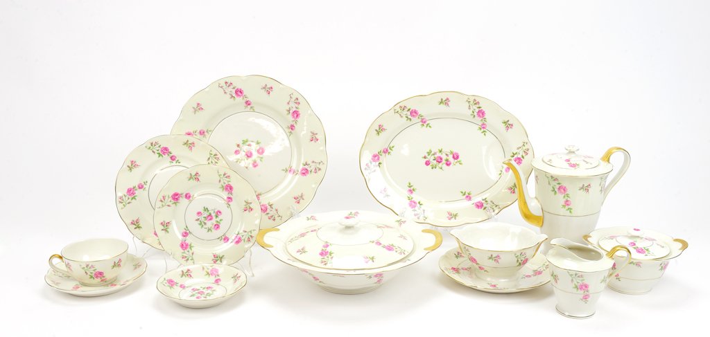 A HAVILAND PORCELAIN PARTIAL DINNER SERVICE 81 pieces: A HAVILAND PORCELAIN PARTIAL DINNER SERVICE The dinner service in the Delware Rose pattern. Comprising 13 teacups, 11 saucers, 13 dinner plates, 12 luncheon plates, a teapot, a covered sugar, a creame