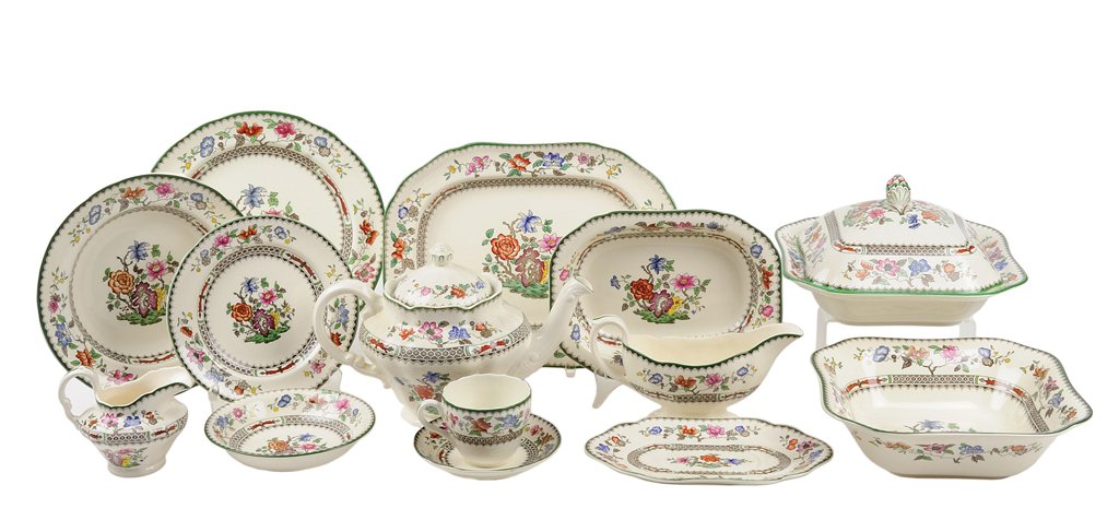 A SPODE PORCELAIN PARTIAL DINNER SERVICE 56 pieces: A SPODE PORCELAIN PARTIAL DINNER SERVICE In the Chinese Rose pattern. The service comprising a serving tray, three serving bowls, a lidded tureen, 7 teacups, 7 saucers, a creamer, a sauce boat, a teap