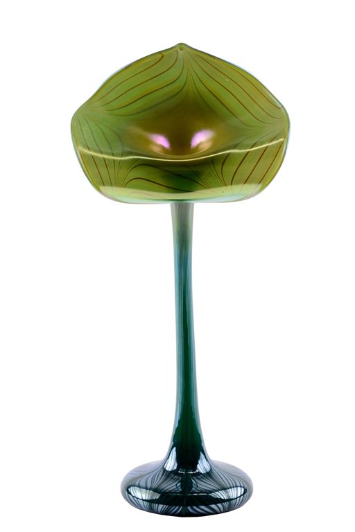 AN EARLY ORIENT & FLUME JACK-IN-THE-PULPIT STUDIO ART: AN EARLY ORIENT & FLUME JACK-IN-THE-PULPIT STUDIO ART GLASS VASE The Orient & Flume jack-in-the-pulpit vase executed in green, blue and gold aurene with pulled feather design, the flared pan with gold