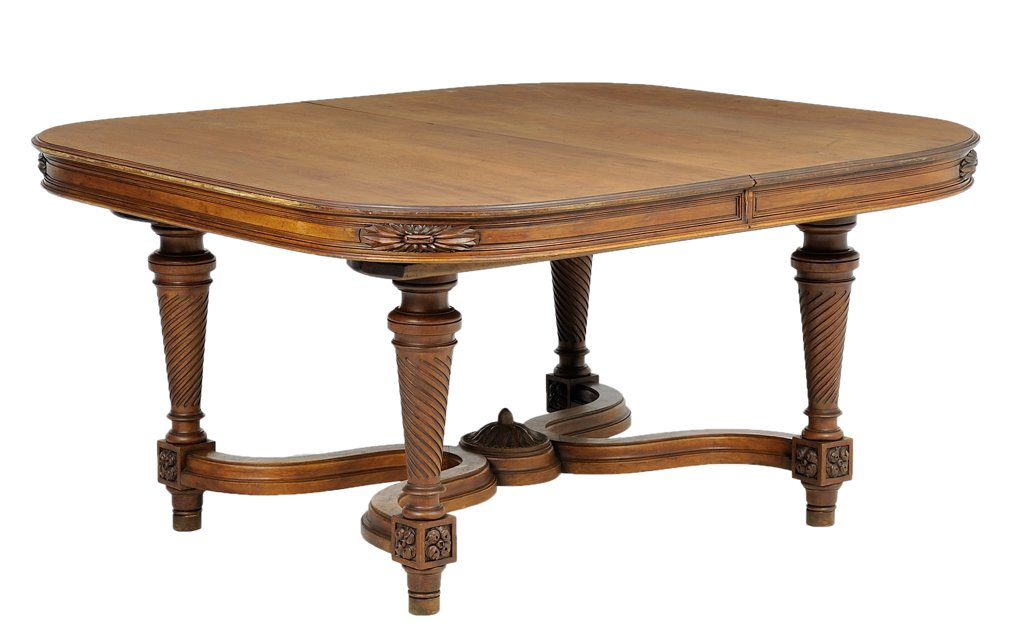 A FRENCH LOUIS XVI STYLE DINING TABLE: A FRENCH LOUIS XVI STYLE DINING TABLE The table having a rectangular top with rounded corners, raised on cylindrical tapering legs, joined by X-form stretcher raised on shaped rosette carved feet. H 2