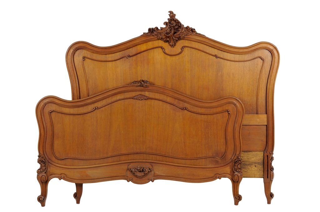 A FRENCH LOUIS XV STYLE BED: A FRENCH LOUIS XV STYLE BED The headboard having a carved acanthus leaf crest over the curved top rail. Each raised on short cabriole legs. Comprised of headboard, footboard and side rails. W 55 inche