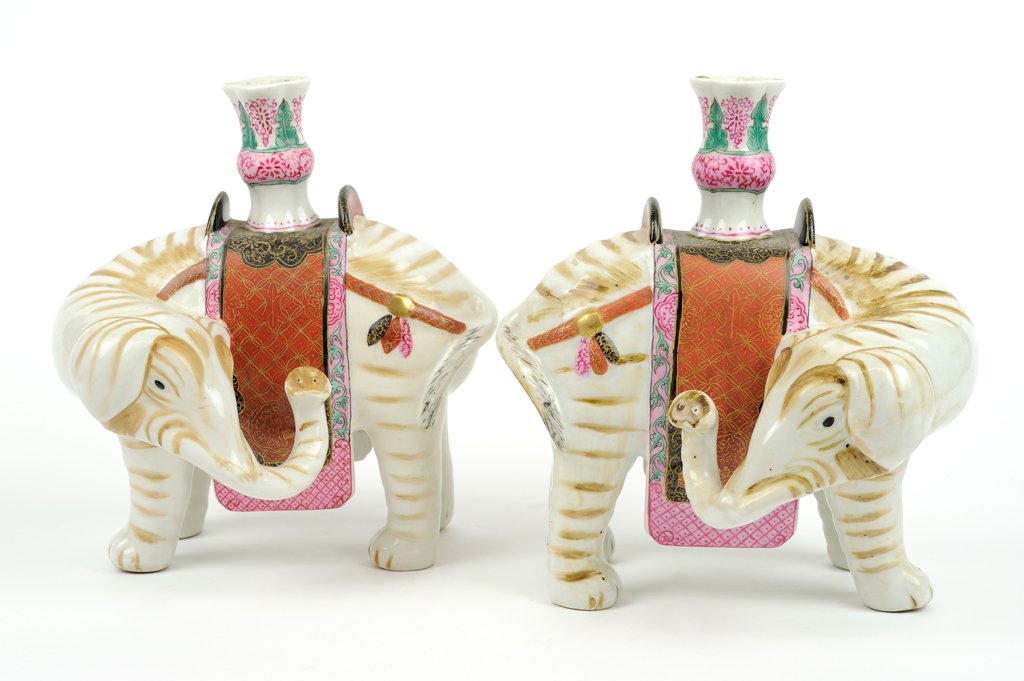 A PAIR OF MOTTAHEDEH CHINESE EXPORT STYLE PORCELAIN: A PAIR OF MOTTAHEDEH CHINESE EXPORT STYLE PORCELAIN CANDLESTICKS OR JOSS STICK HOLDERS The pair of Mottahedeh porcelain in the Chinese export style with famille rose enamel decoration, the base marked
