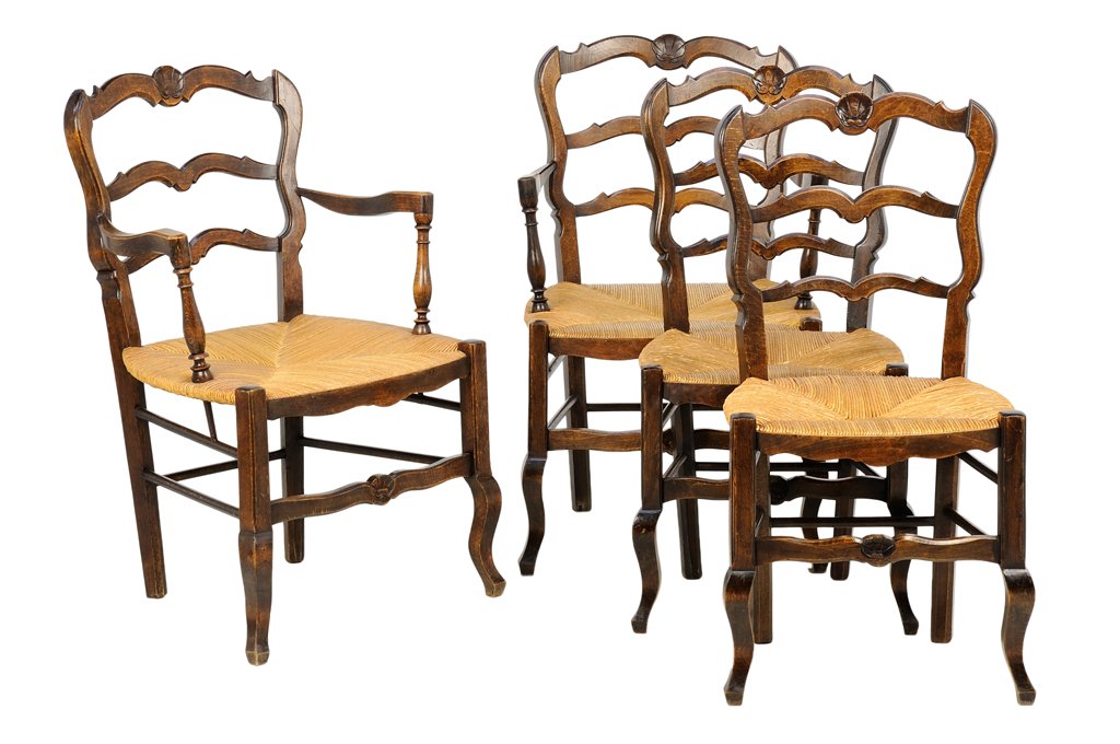 A SET OF FOUR FRENCH PROVINCIAL STYLE CHAIRS: A SET OF FOUR FRENCH PROVINCIAL STYLE CHAIRS Comprising two armchairs and two side chairs. Each chair having a curved crest rail centered with a carved shell over the horizontal back splats, above the