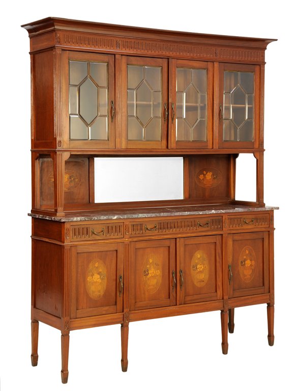 A FRENCH LOUIS XVI STYLE BUFFET A DEUX CORPS: A FRENCH LOUIS XVI STYLE BUFFET A DEUX CORPS The buffet a deux corps having a flared cornice over the carved frieze, above four glazed astragal doors, flanked by engaged fluted columns, raised on colu
